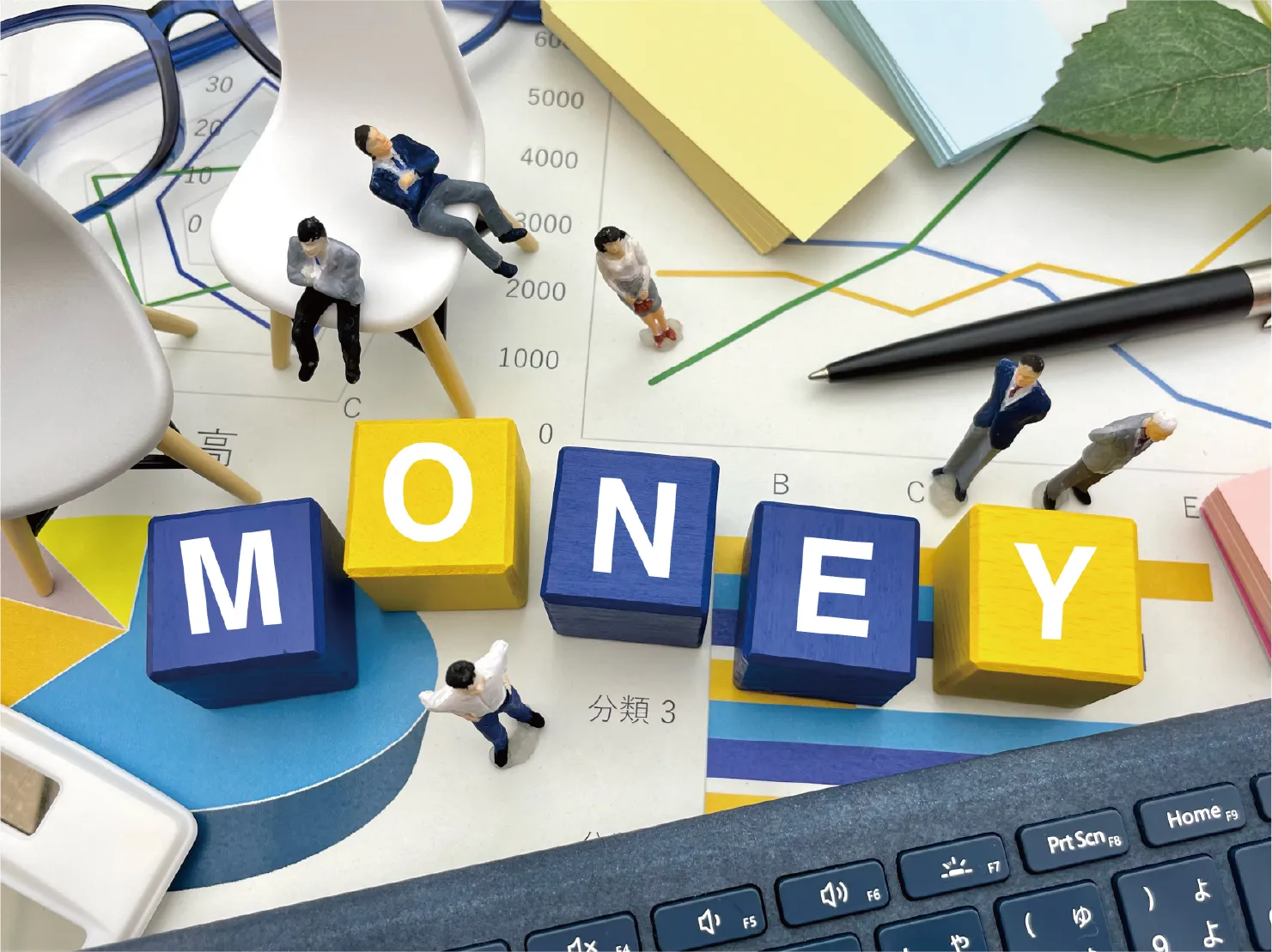 moneyとかかれたブロックの写真